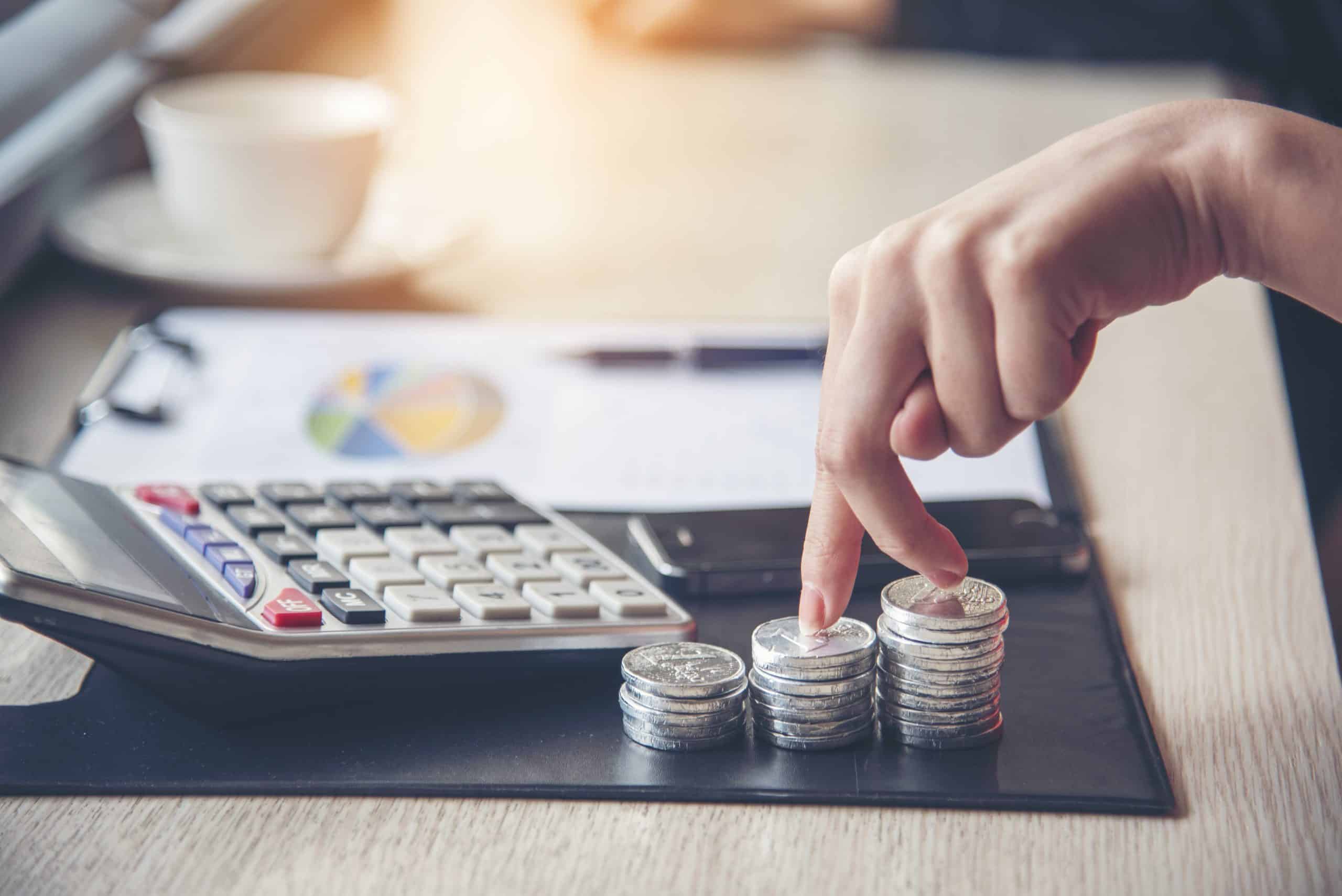 Collaboration worker in office working together with Excel graph